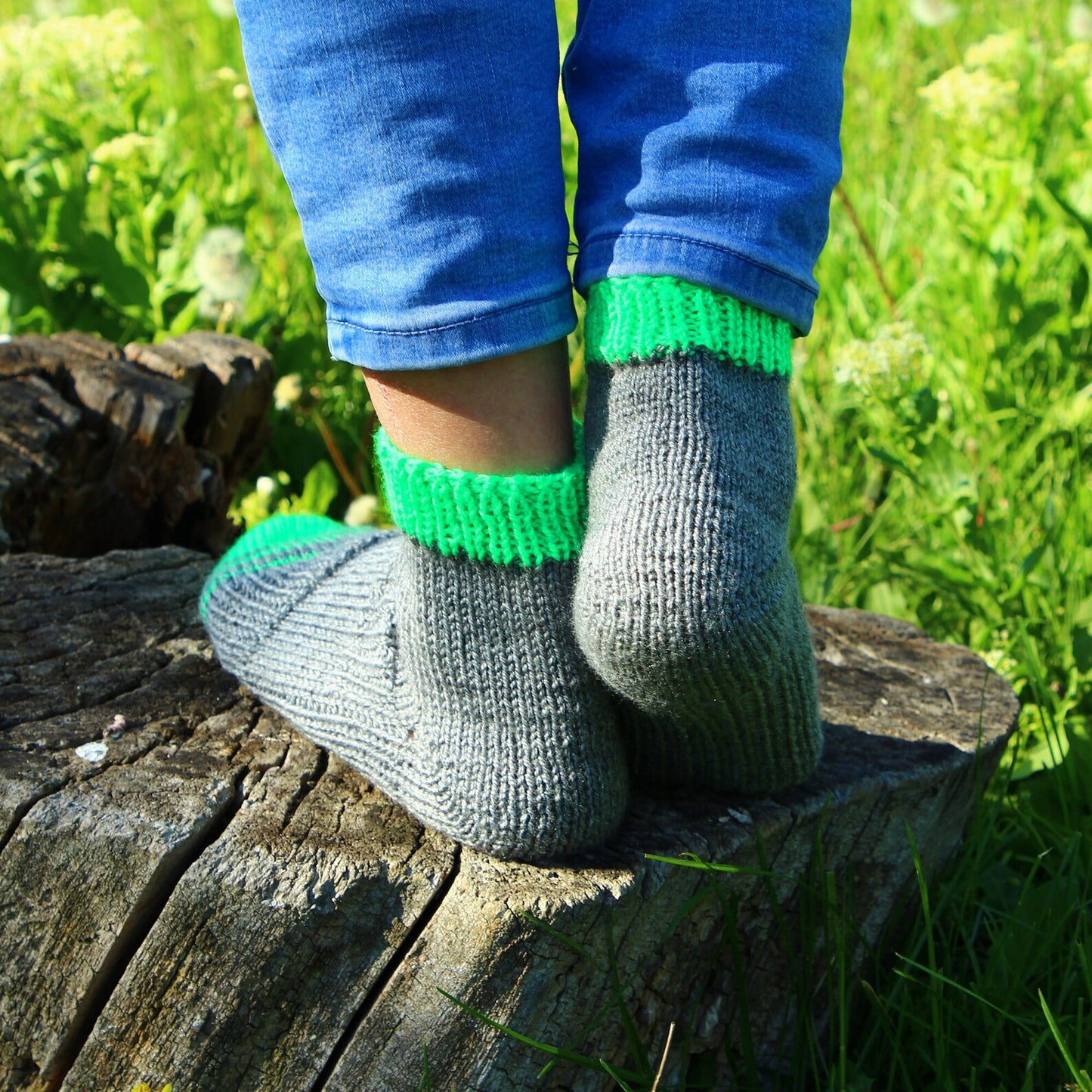 Warm and cozy acrylic socks displayed in a natural outdoor setting