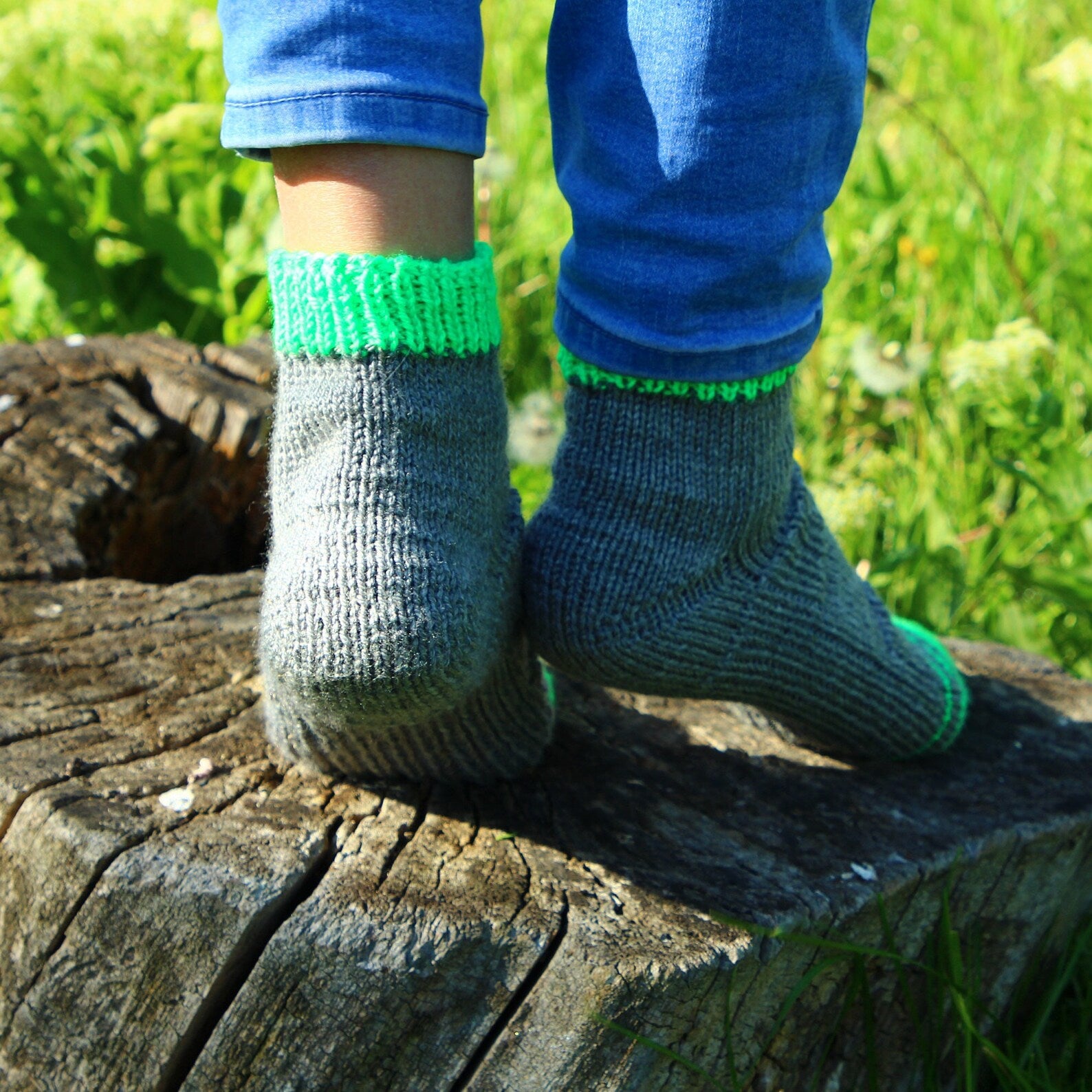 Durable acrylic socks for winter warmth, featured in a rustic setting