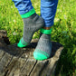 Stylish gray socks with green cuffs, perfect for hiking enthusiasts