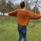 Oversized cropped sweater with volume sleeve in orange