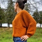 Oversized cropped sweater with volume sleeve in orange