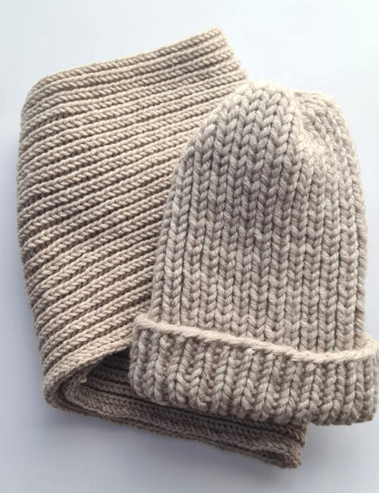 2 piece set of beige knitted hat and infinity scarf