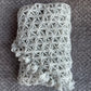 Triangle lace shawl in gray