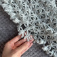 Triangle lace shawl in gray