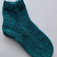 Plain blue quarter socks with fancy heel